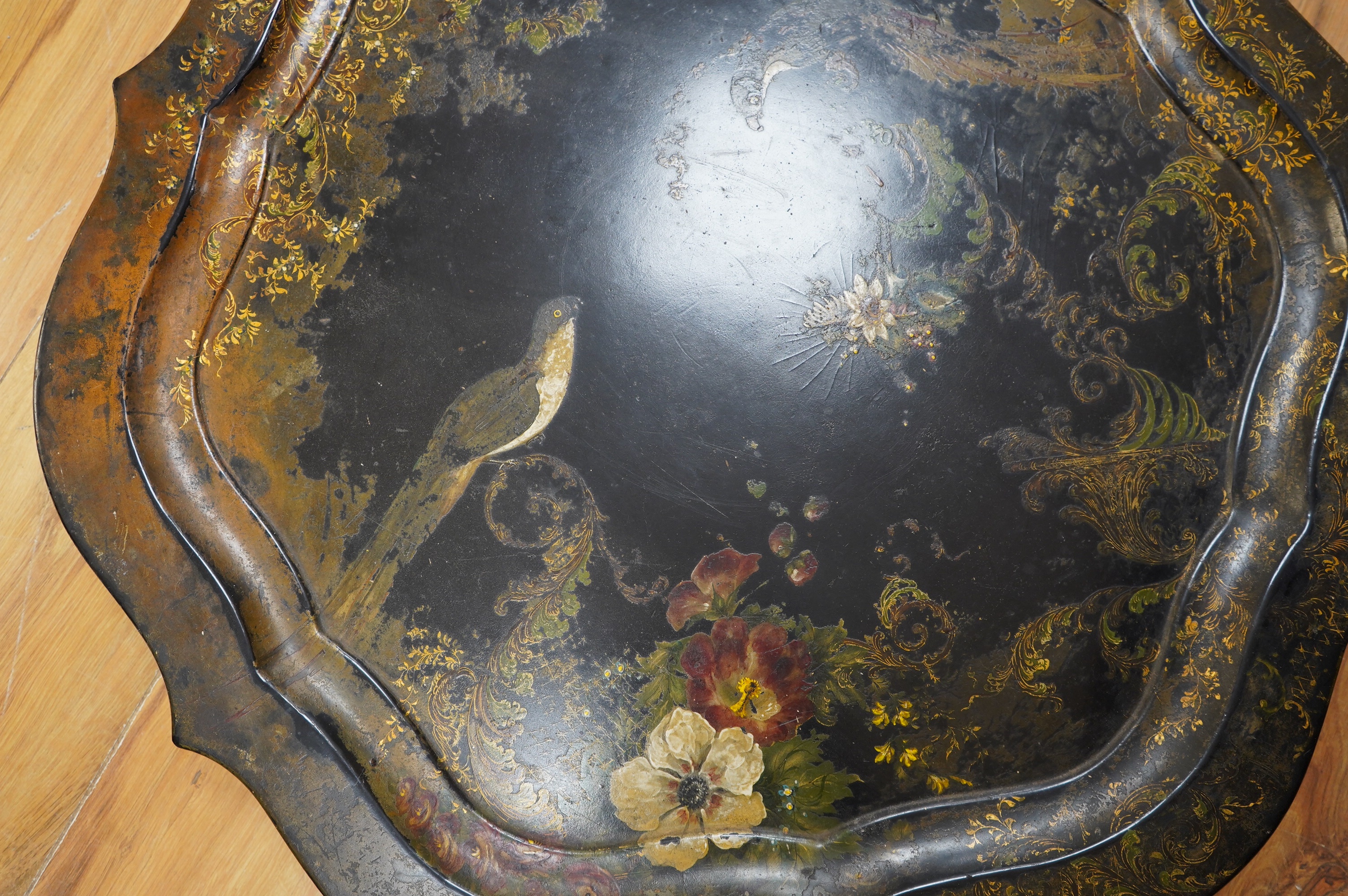 Three large Victorian papier mâché trays, largest 71cm wide. Condition - all have faults